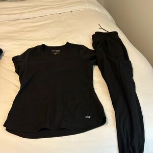 Woman’s Grey’s Anatomy, black scrub set